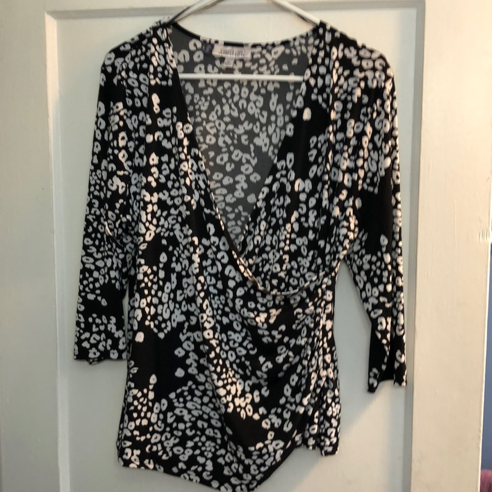 Jennifer Lopez faux wrap cinched side animal print